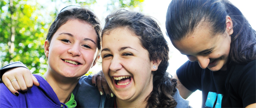 Three girls laughing